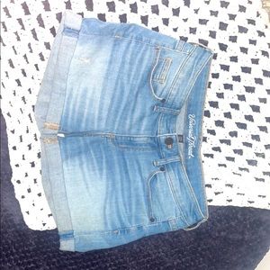 Blue,slightly distressed shorts from the brand Universal Tread
